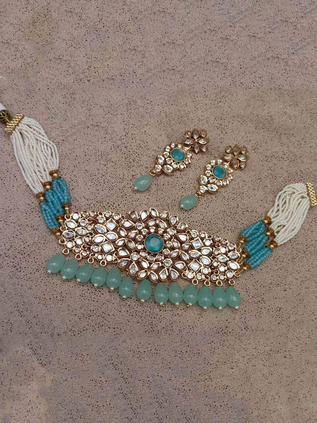 Ishhaara Kundan Stone Studded Necklace And Earings Set