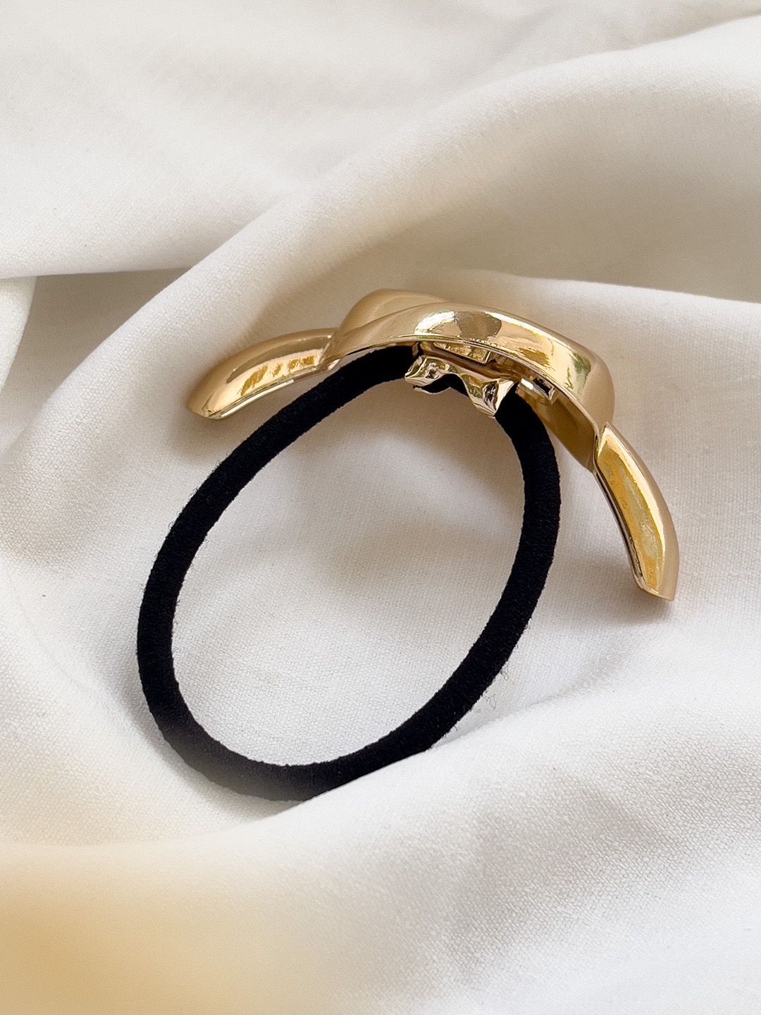 Ishhaara Bold Gold Knot Stainless Steel Rubber Band