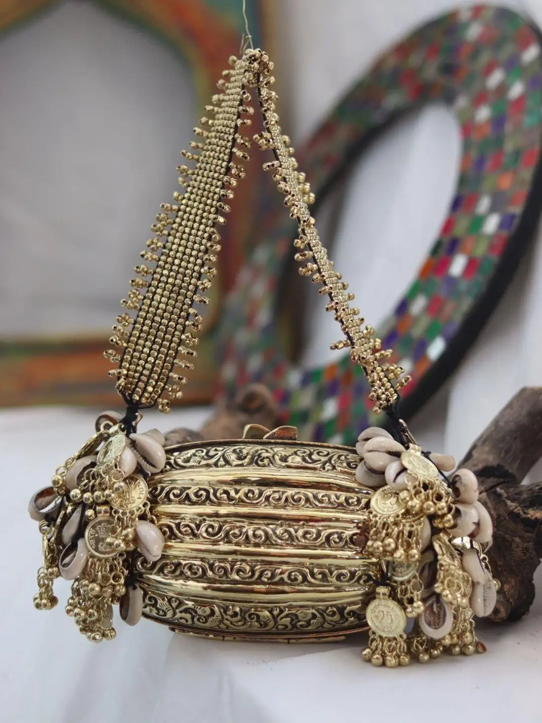 Ishhaara Drum Shaped Banjara Metal Clutch