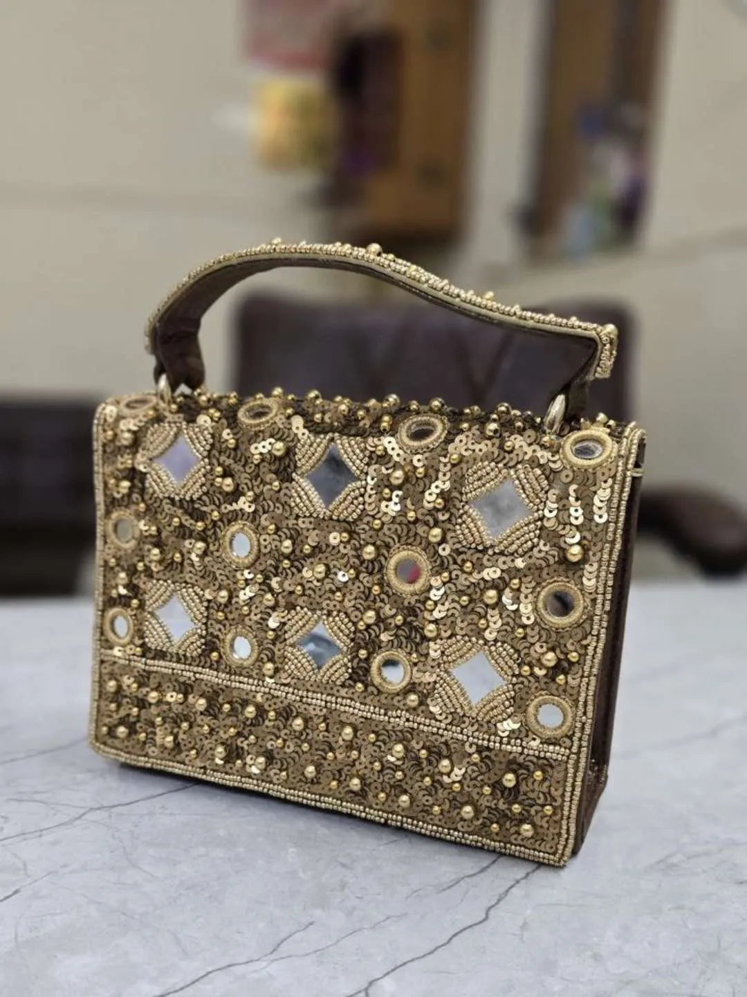 Gold designer bag best sale