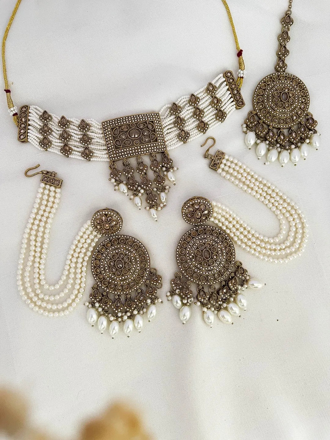 Gold Tone Kundan And Multistrand Pearls Choker Necklace