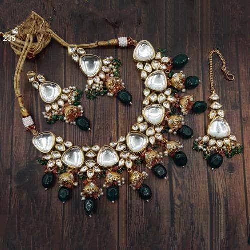 Ishhaara Green Big Kundan Antique Jumki Set