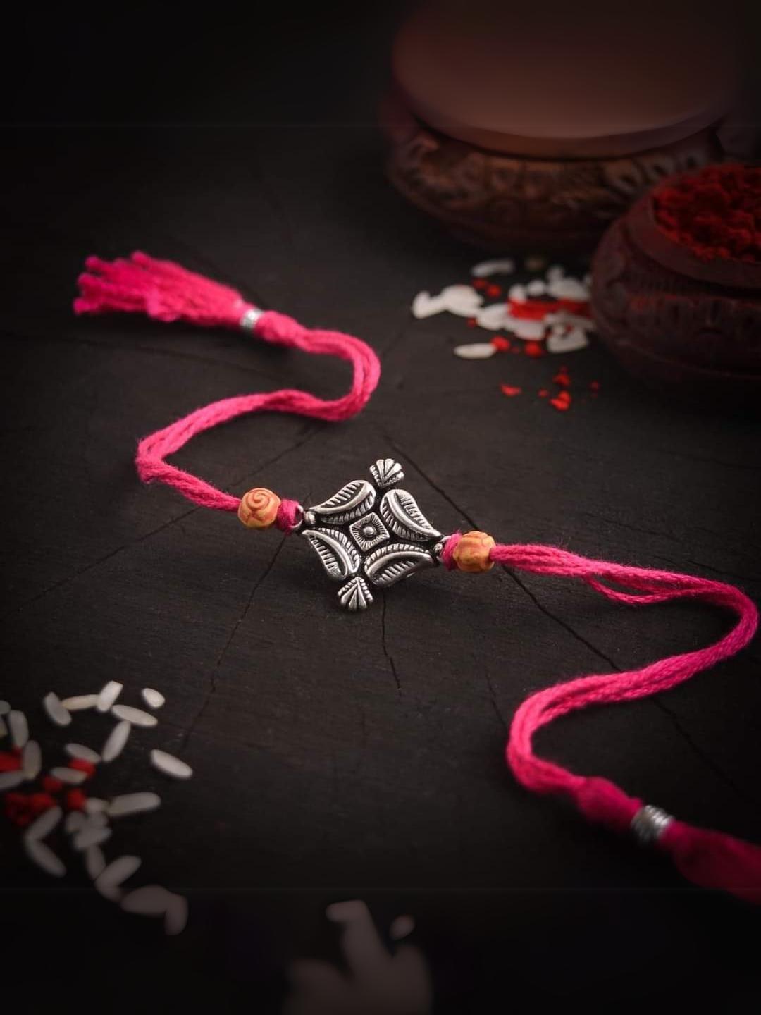 Ishhaara Leaf Shaped German Silver Rakhi