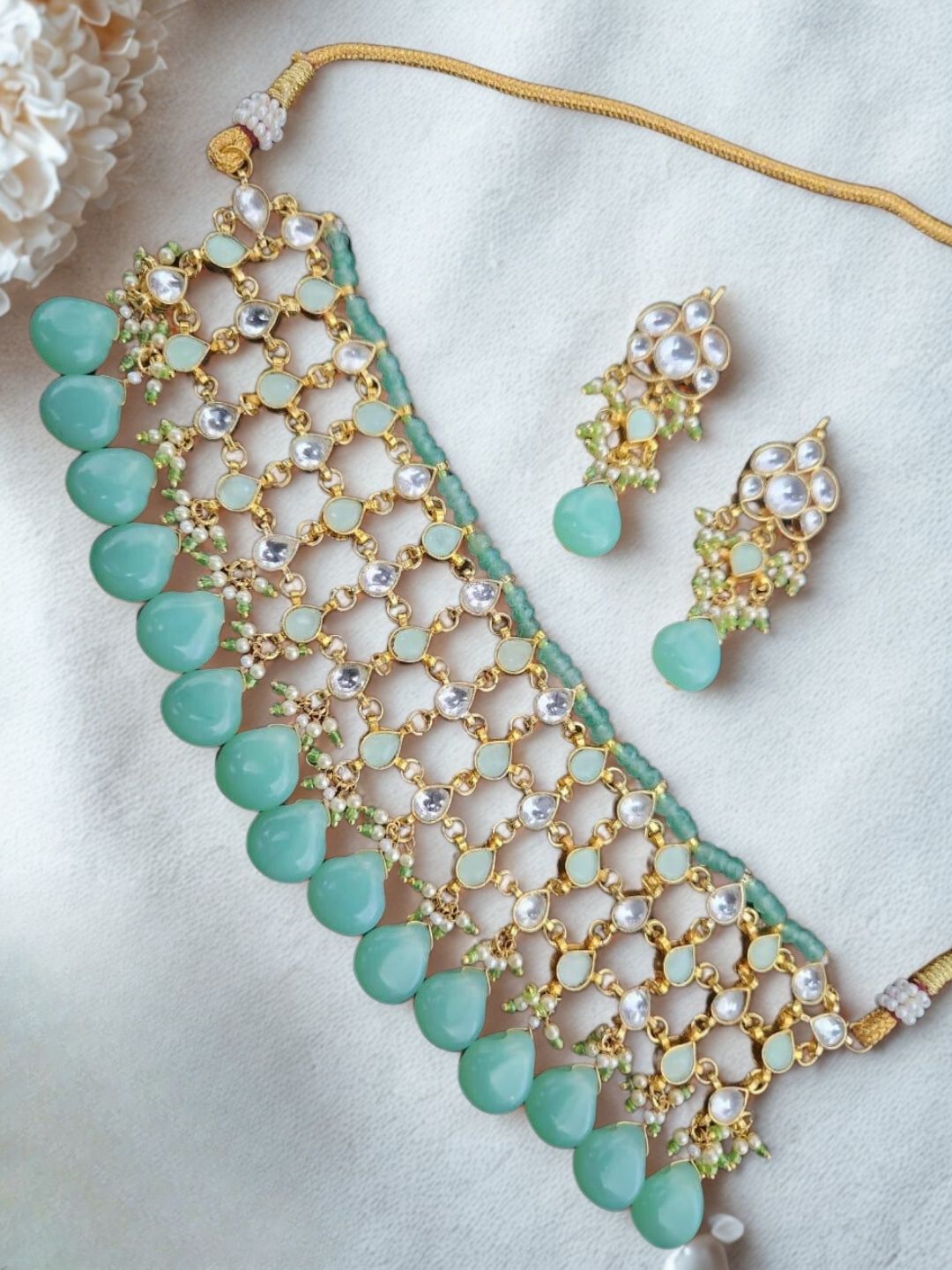 Ishhaara Green Jadau Kundan Embellished Choker Necklace Set