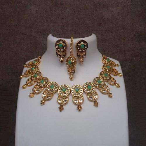 Ishhaara Round Cut Leaf Kundan Necklace And Earring Set