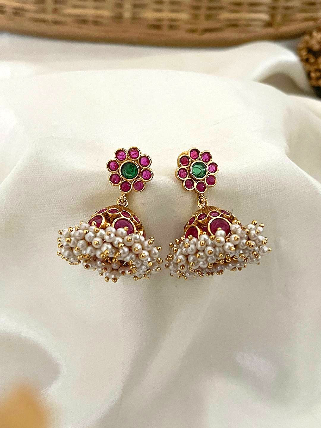 Ishhaara Matte Finish Red Colored Kemp Pearl Flower Necklace Set