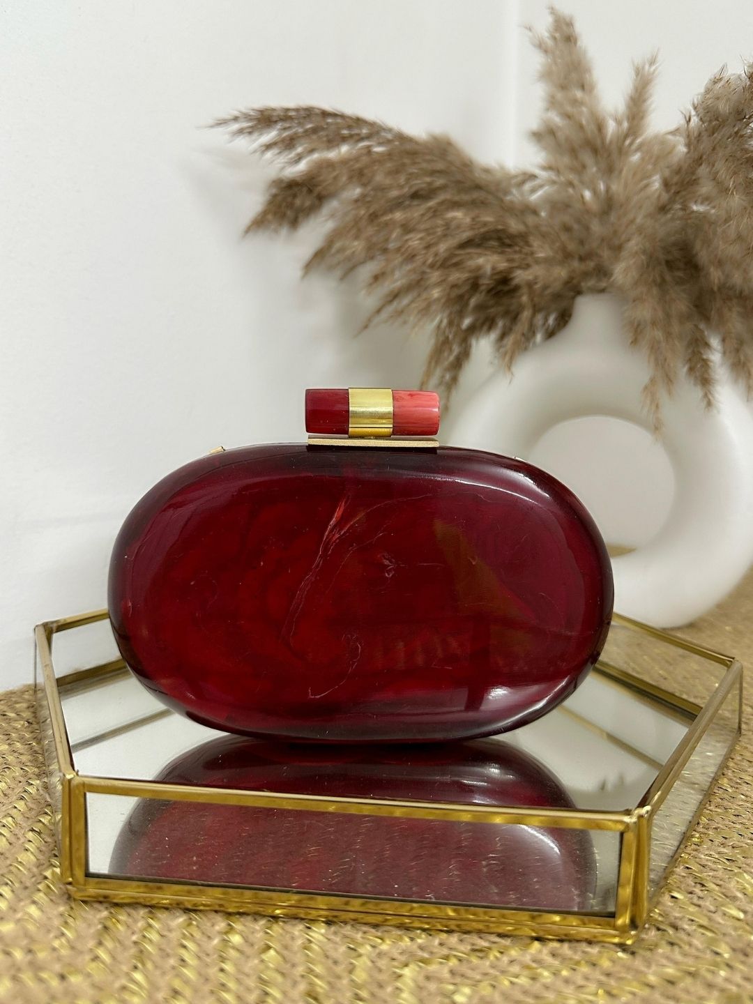 Ishhaara Red Capsule Resin Clutch Bag