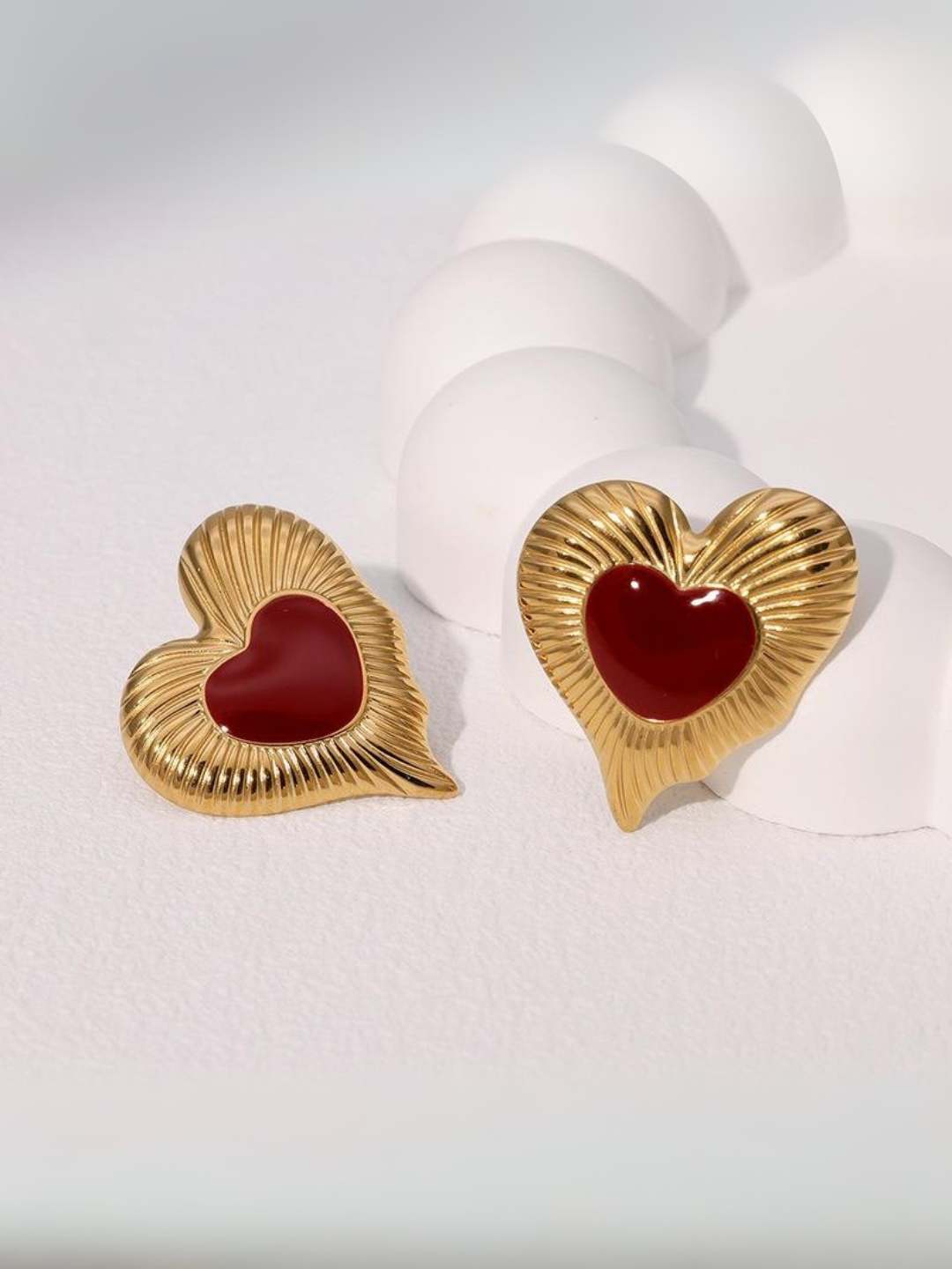 Ishhaara Red Elegant Heart Shaped Earrings