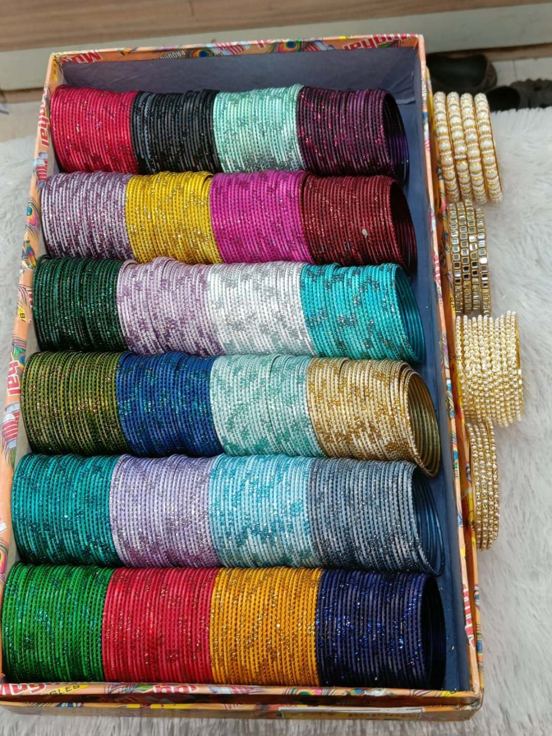 Ishhaara Set Of 48 Designer Bangle With Side Bangles