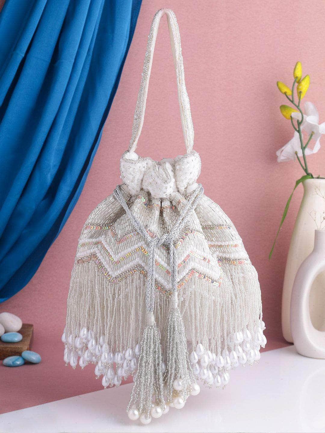 Ishhaara Designer Heavy Potli In Silver Work