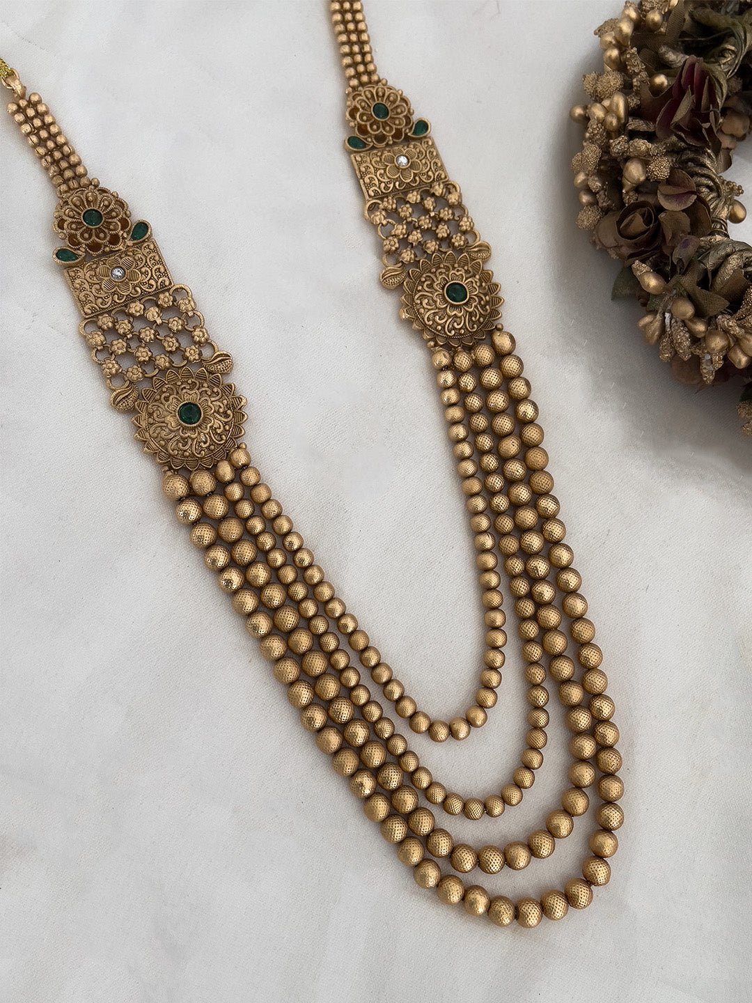 Ishhaara Green Floral Kundan Studded Golden Pearl Four Layered Mala