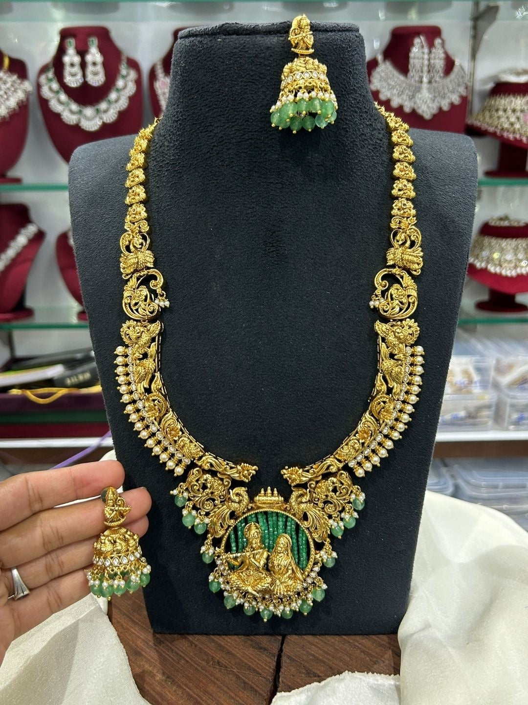 Ishhaara Green Kundan Temple Long Necklace Set — handcrafted Indian jewellery