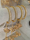 Ishhaara Antique Gold Stone Bangles With Floral Jhumka