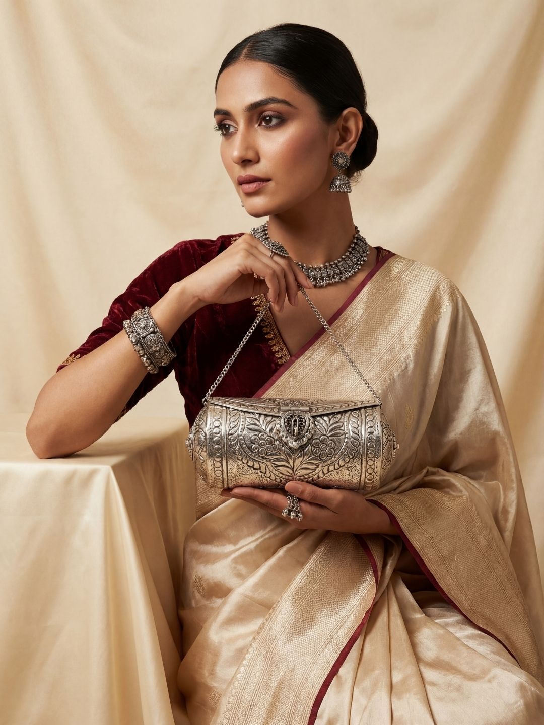 Ishhaara Antique Metal Clutch