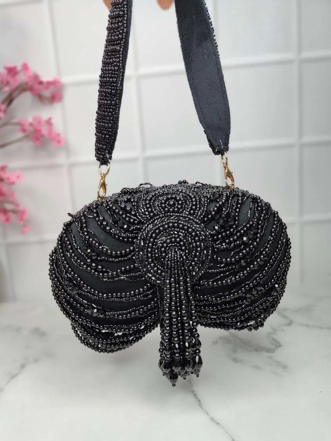 Ishhaara Black Embroidery Tassel Oval Beauty Clutches