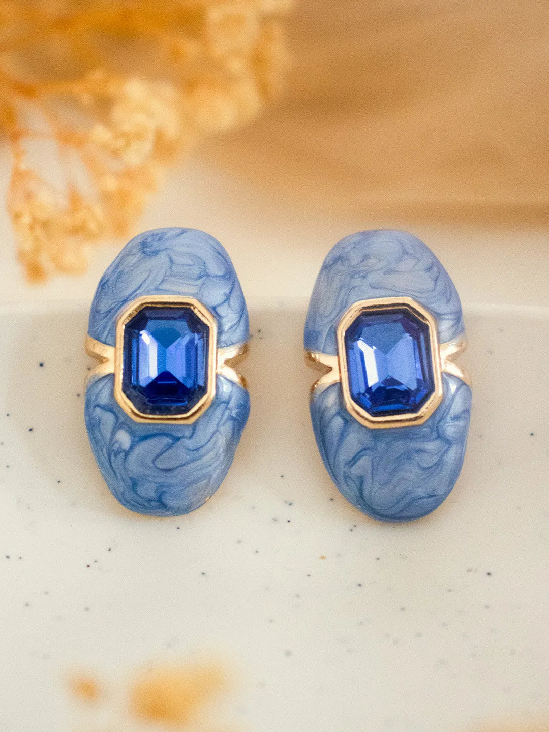 Ishhaara Blue Carved Natural Coral Oval Earrings