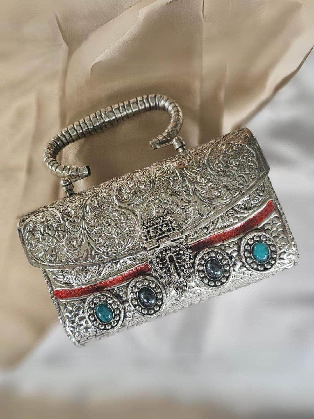Ishhaara Exclusive Hand Carved High Quality German Silver Clutch