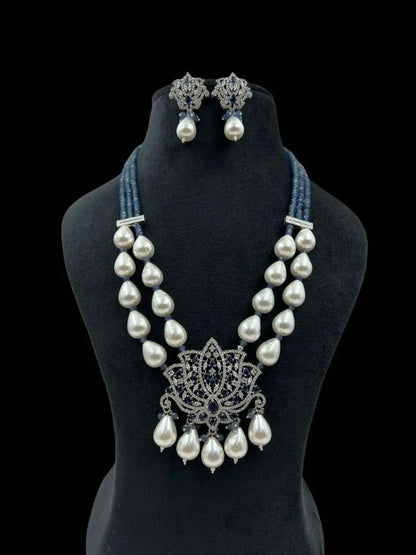 Ishhaara Blue Lotus Shaped Pendant Studded Long Necklace