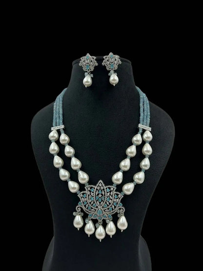 Ishhaara Blue Lotus Shaped Pendant Studded Long Necklace