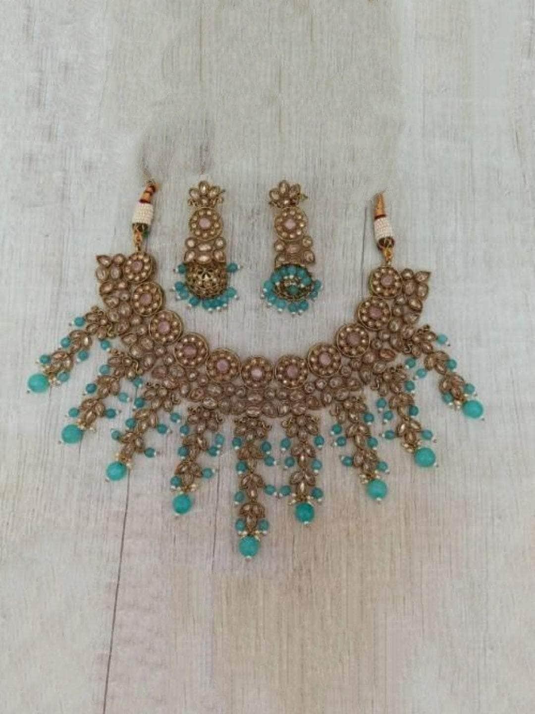 Ishhaara Reverse Ad Tassel Choker And Earing Set