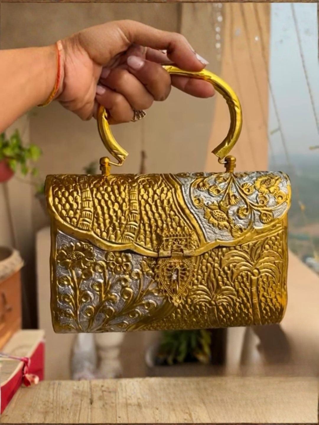 Ishhaara Brass Golden Silver Clutch