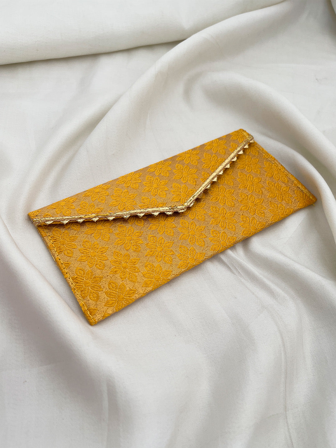 Ishhaara Bright Yellow Patola Silk Envelope Clutches