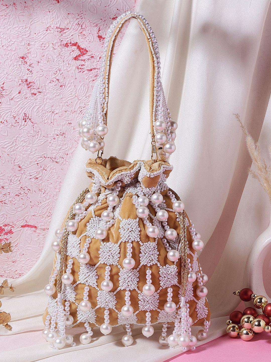 Ishhaara Brown Designer Heavy Potli With Pearl Hanging