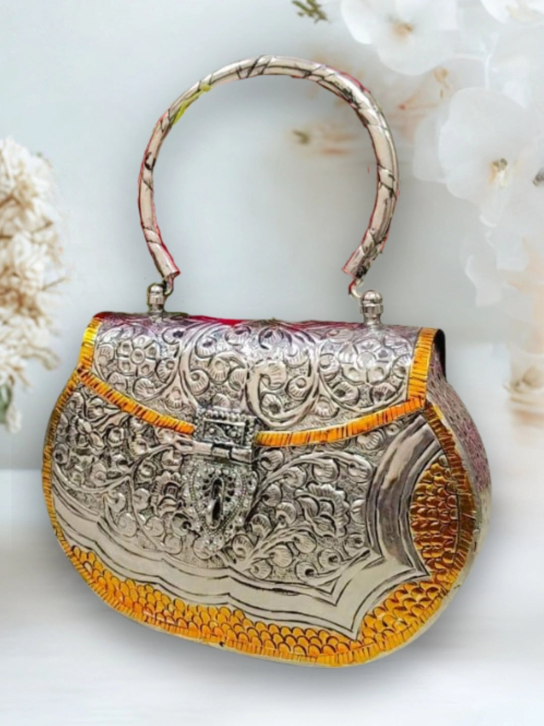 Ishhaara Dual Tone German Silver Metal Clutch