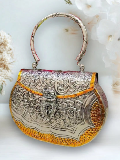 Ishhaara Dual Tone German Silver Metal Clutch