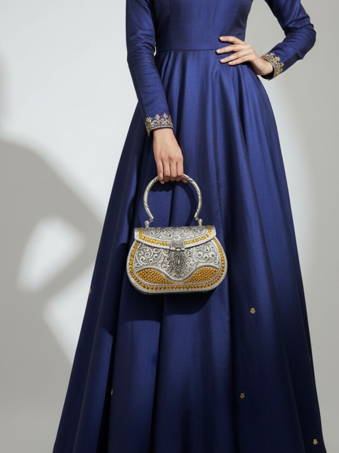 Ishhaara Dual Tone German Silver Metal Clutch