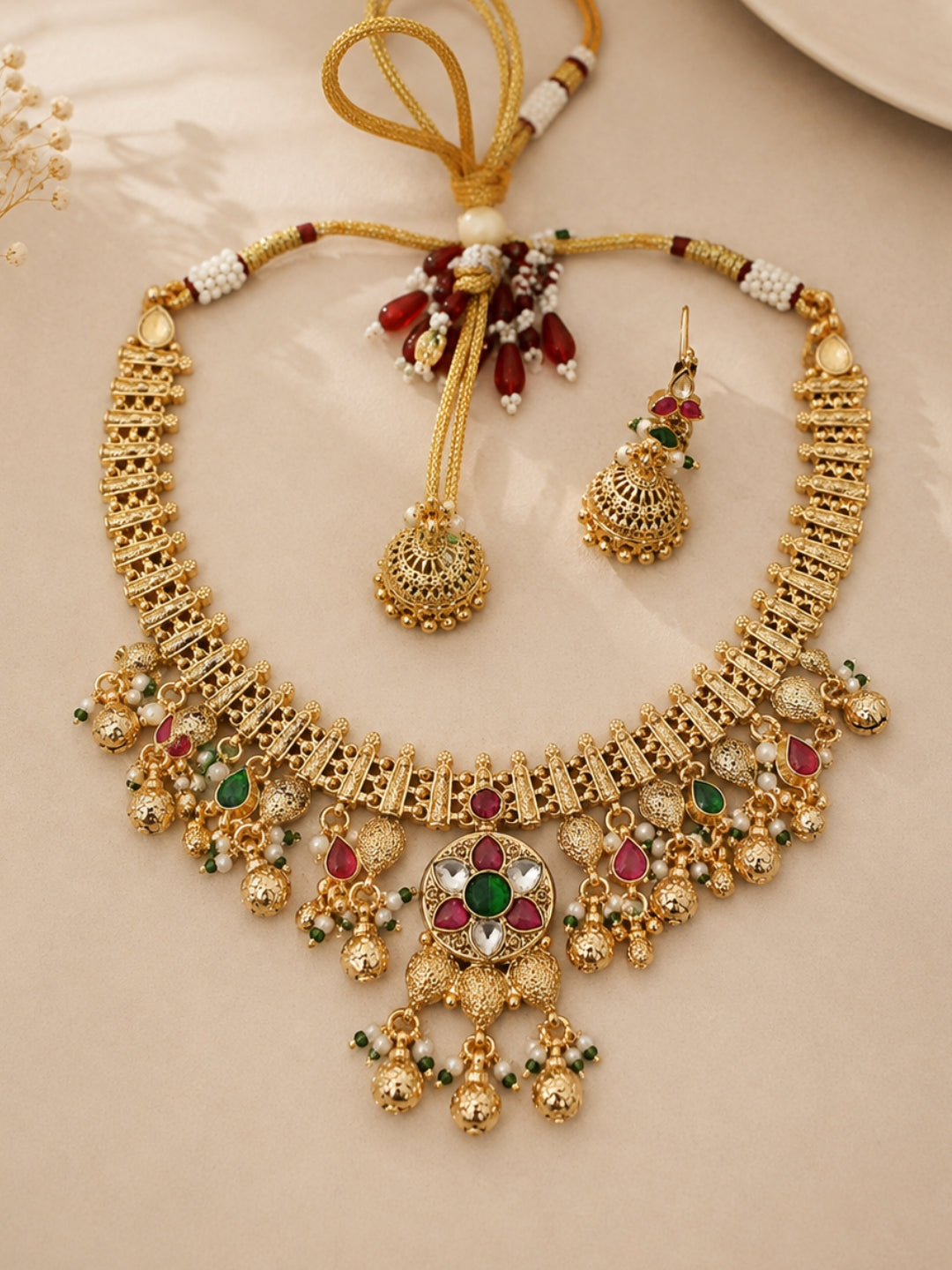 Ishhaara Elegant Gold Necklace And Jhumka Set