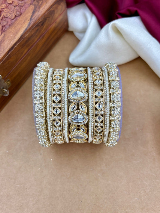 Ishhaara Elegant Kundan Bangle Set - A stunning collection of gold and stone bangles