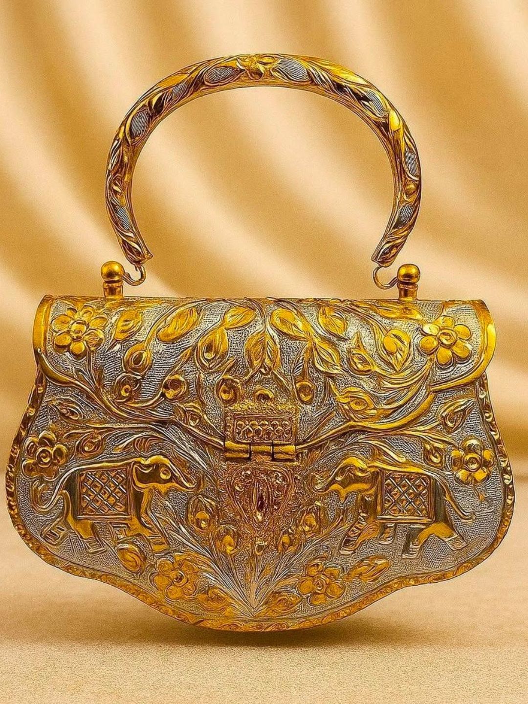 Ishhaara Elephant And Floral Engraved Brass Clutch