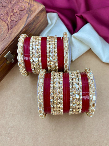 Ishhaara Embellished Red Plastic Bangle Set - A stack of red plastic bangles adorned with intricate Kundan stone and pearl designs - view 2