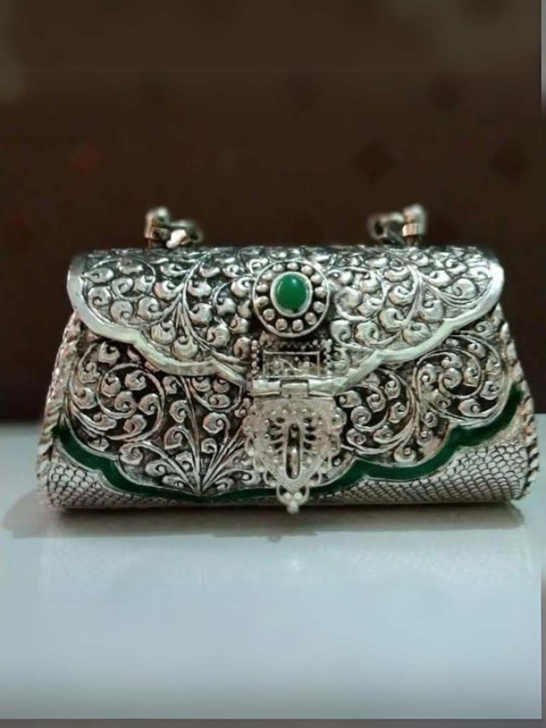 Ishhaara Emerald Stone Studded Handmade Intricate Designed Metal Purse