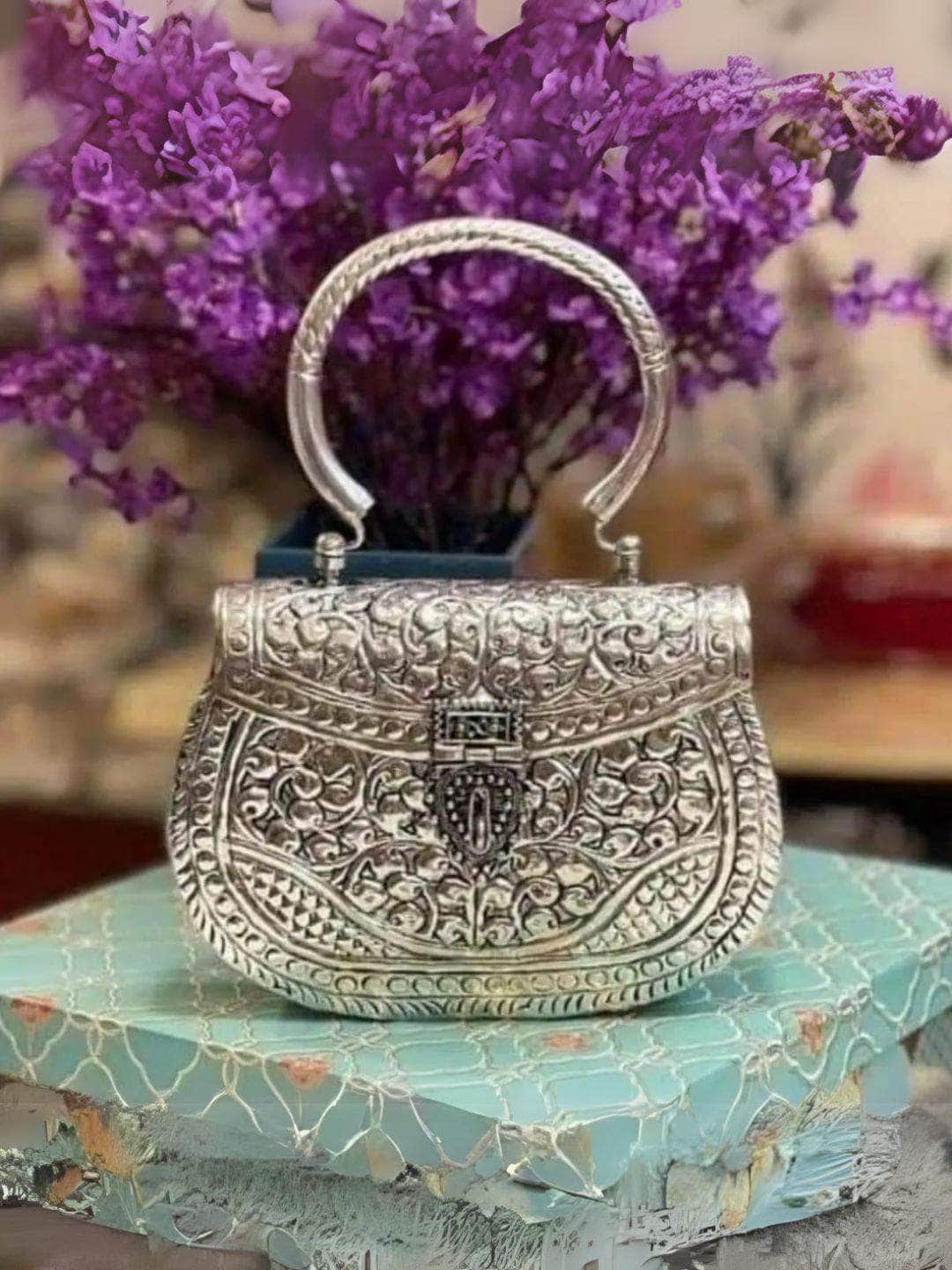Ishhaara Exclusive hand carved High quality German silver purse