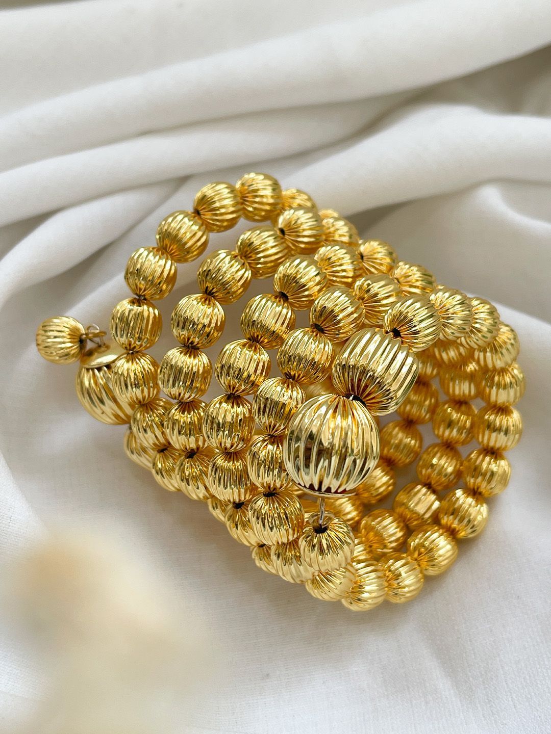 Ishhaara Flexible Layered Gold Plated Contemporary Bracelet