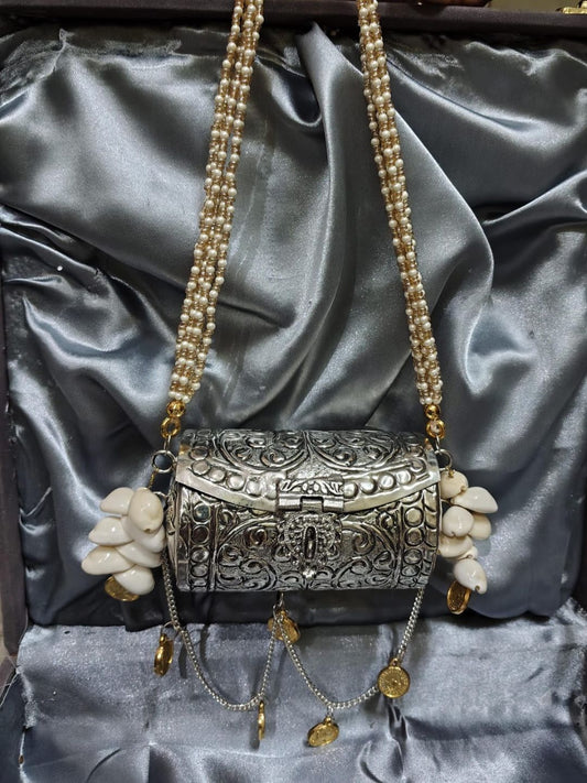 Ishhaara German Silver Pearl Chain Clutch