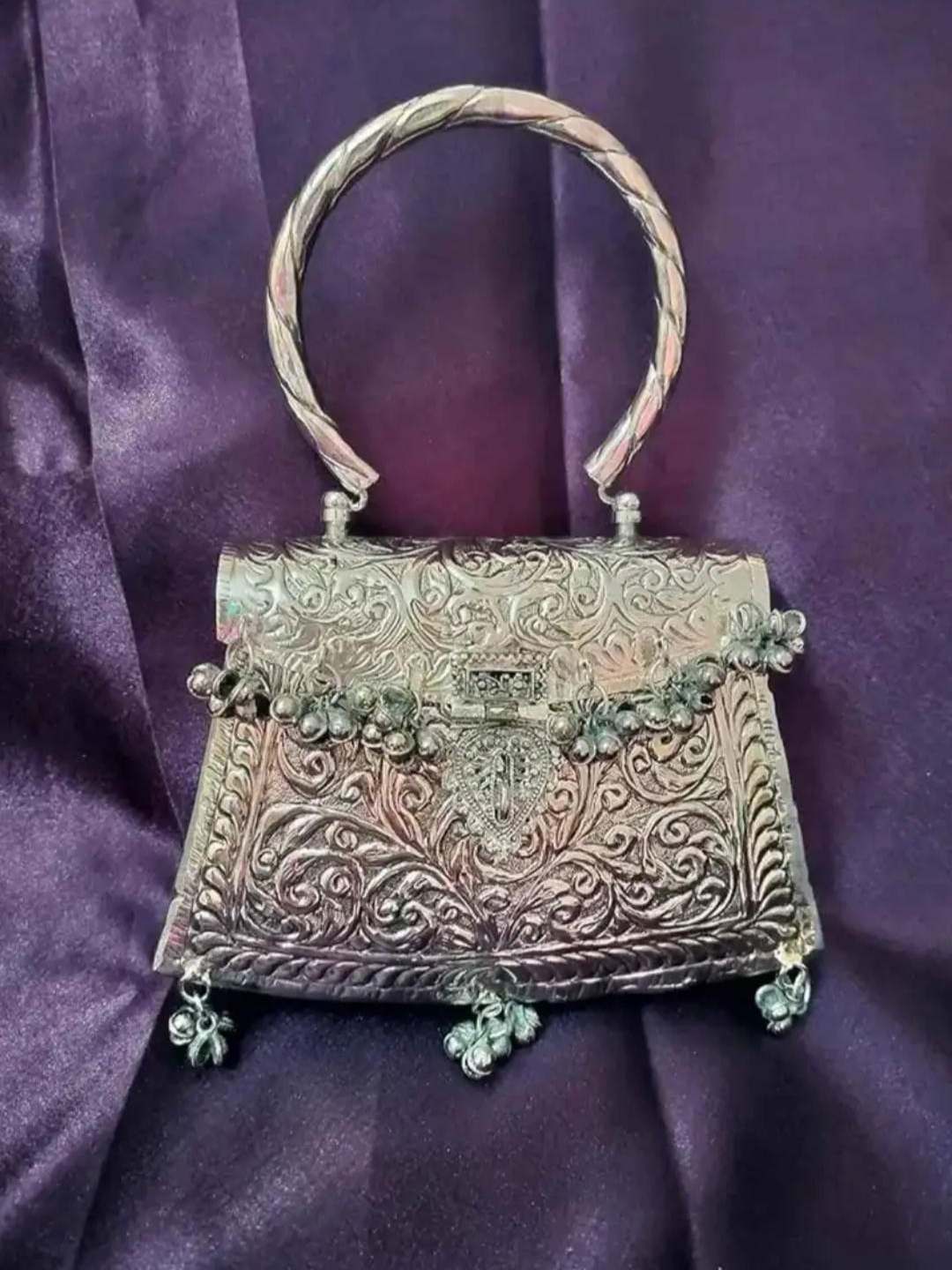 Ishhaara Ghoongroo Attached Silver Handle Metal Clutch