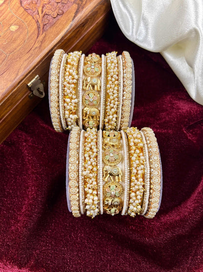 Ishhaara Gold Elephant Bangle Set - a stunning piece of jewelry featuring elephant motifs and intricate designs - view 2
