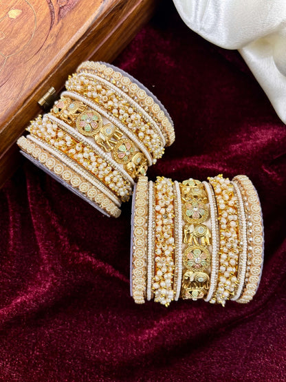 Ishhaara Gold Elephant Bangle Set - a stunning piece of jewelry featuring elephant motifs and intricate designs - view 3