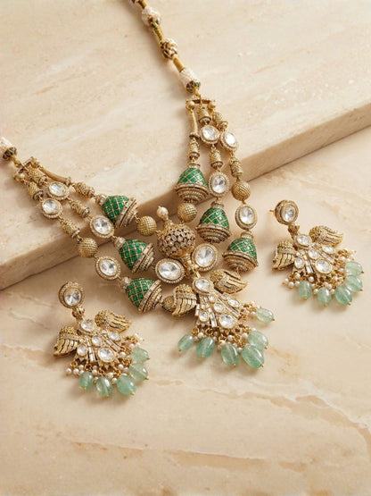 Ishhaara Gold Finish Uncut Polki And Emerald Layered Necklace Set