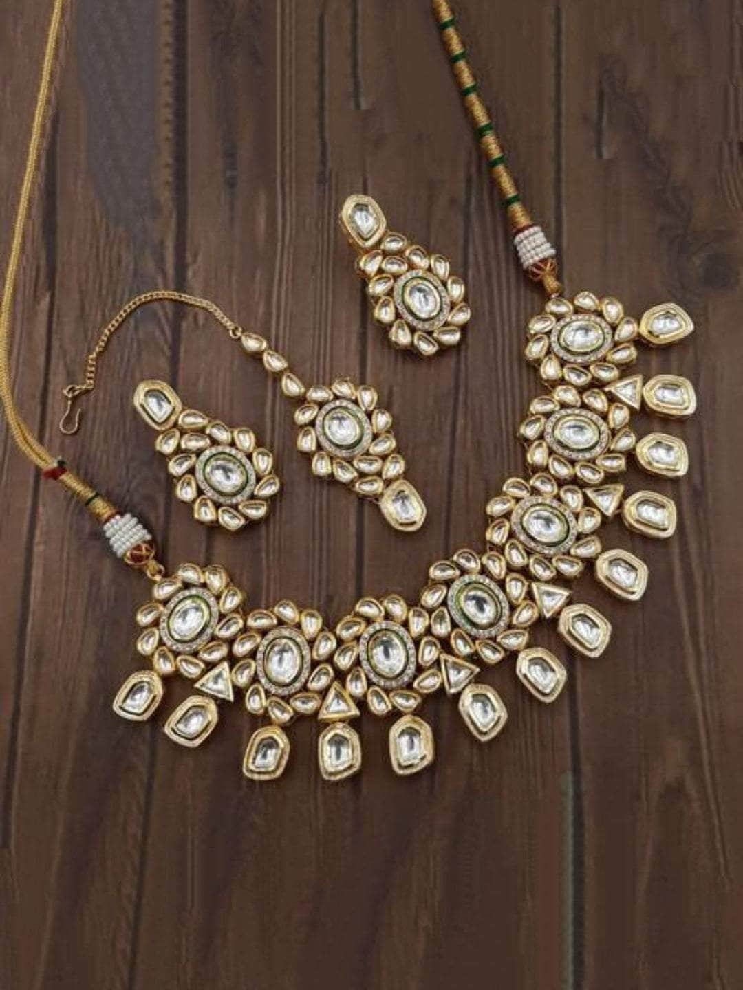 Ishhaara Gold Flower AD Kundna Pentagan Hanging Necklace Earring And Teeka Set