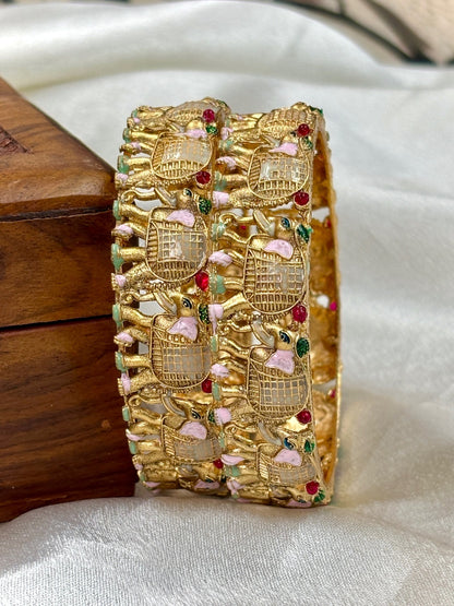 Ishhaara Gold Kundan Bangle with Bird Motif - a stunning piece of jewelry