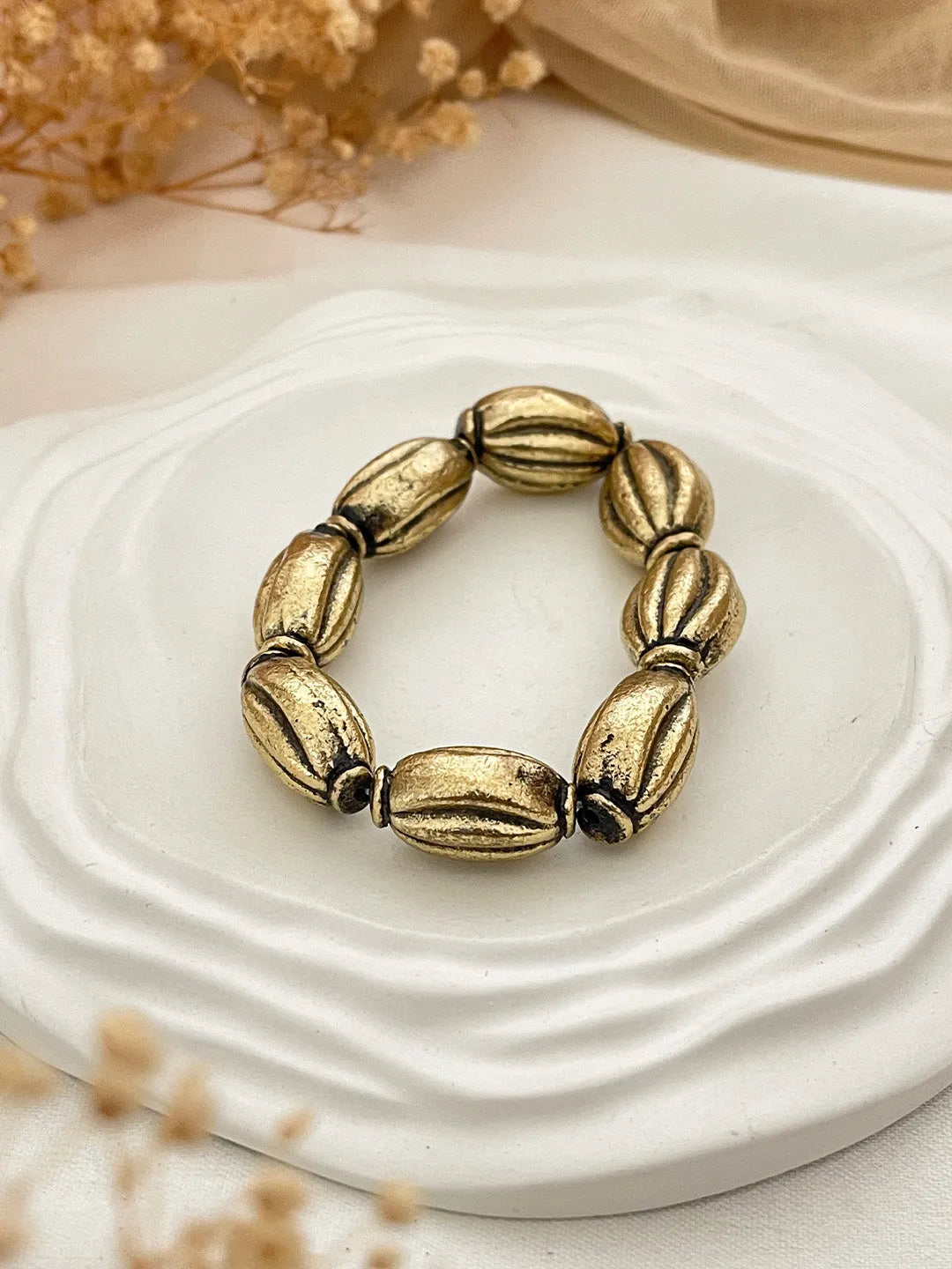 Ishhaara Gold Oval Bead Statement Bracelet