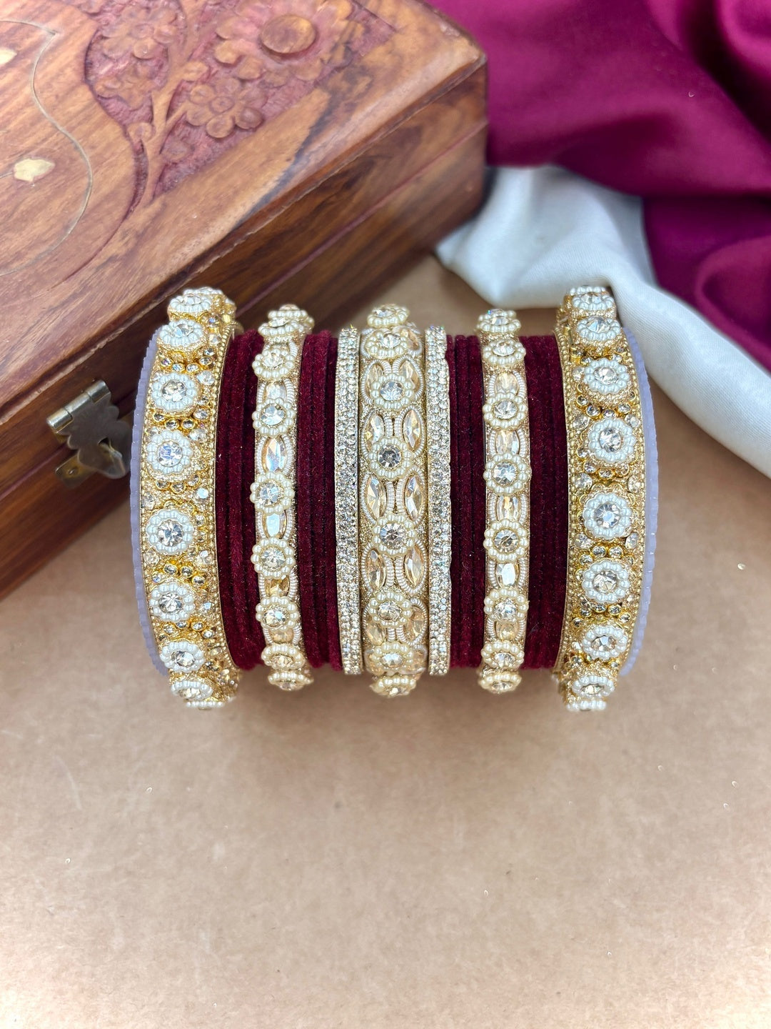 Ishhaara Gold Plated Kundan Bangle Set - A set of gold plated kundan bangles with intricate designs and velvet inner lining - view 12