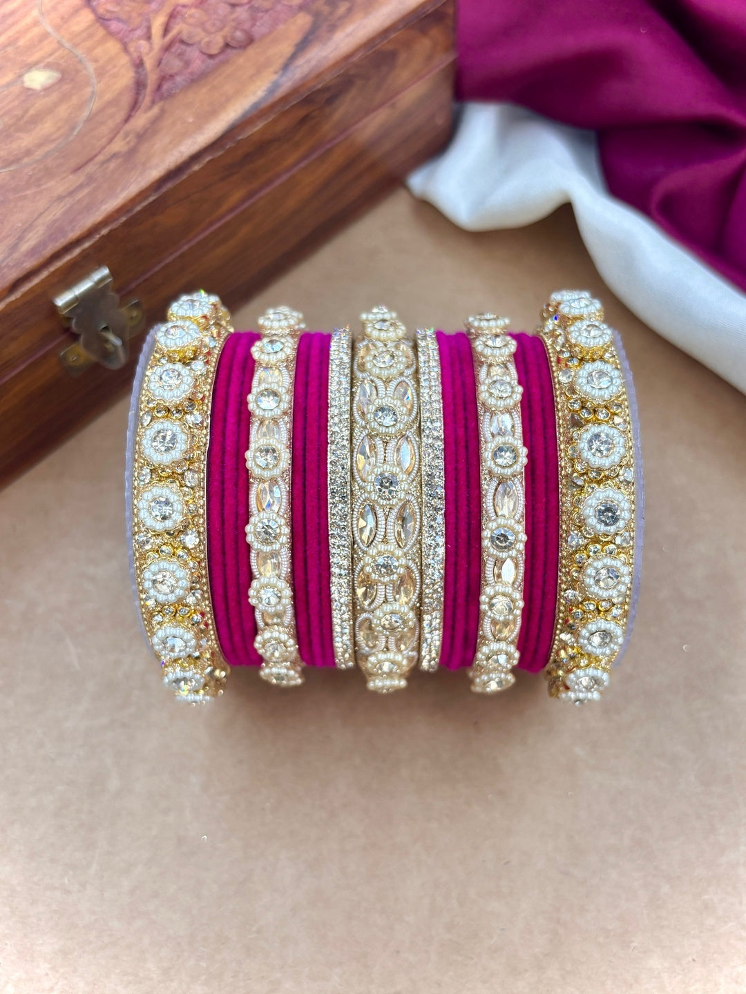 Ishhaara Gold Plated Kundan Bangle Set - A set of gold plated kundan bangles with intricate designs and velvet inner lining - view 15