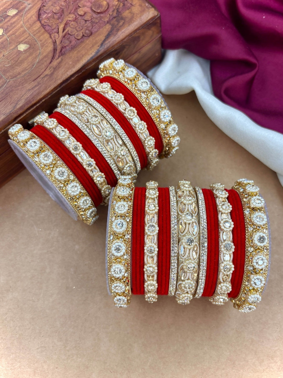 Ishhaara Gold Plated Kundan Bangle Set - A set of gold plated kundan bangles with intricate designs and velvet inner lining - view 17