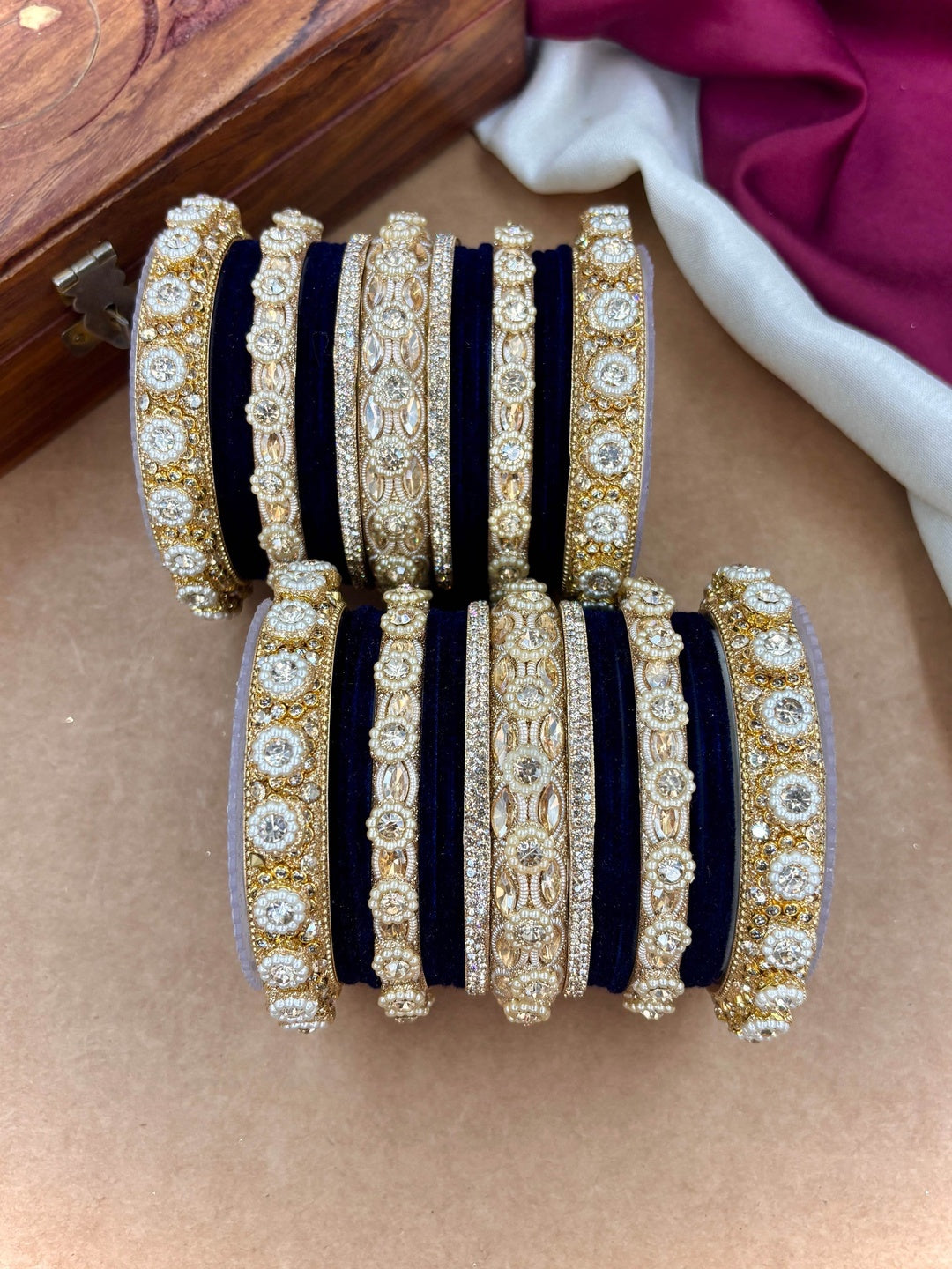 Ishhaara Gold Plated Kundan Bangle Set - A set of gold plated kundan bangles with intricate designs and velvet inner lining - view 2