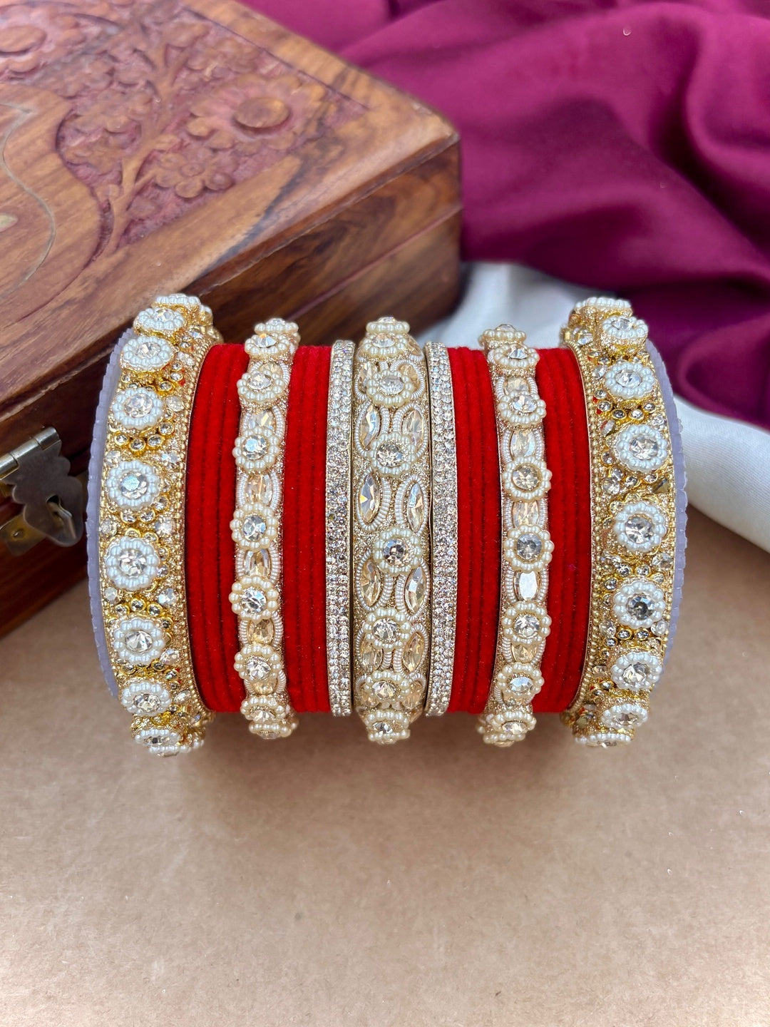 Ishhaara Gold Plated Kundan Bangle Set - A set of gold plated kundan bangles with intricate designs and velvet inner lining - view 20